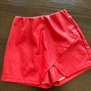 Red leather shorts